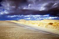 stormy sky over sand