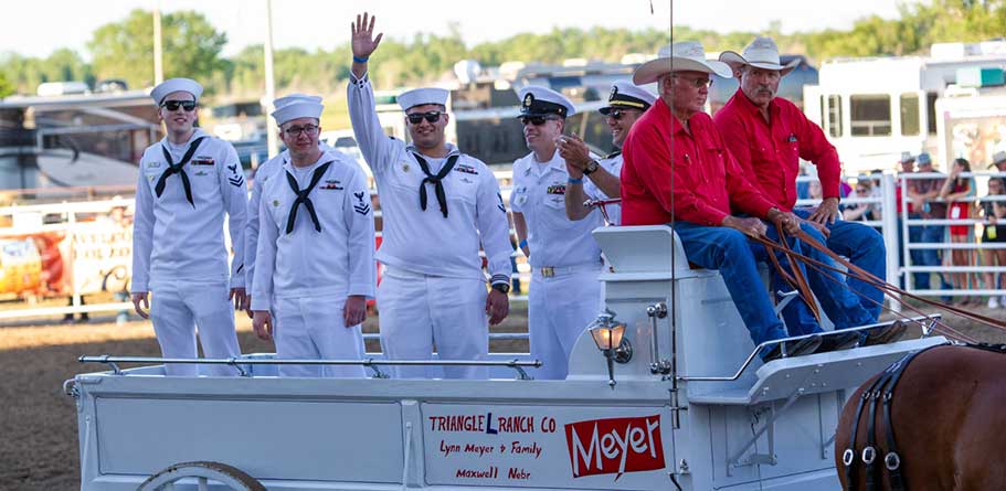 sailors on a horse carriage 