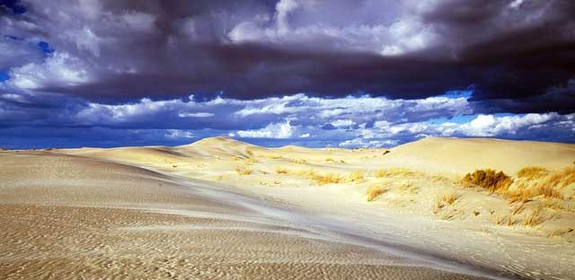 stormy sky over sand